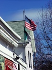 US & Italian flags at Caruso's pizza